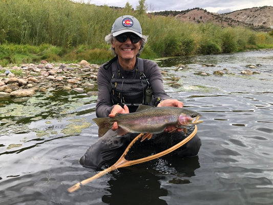 Angler fly fishing the Eagle River in Colorado