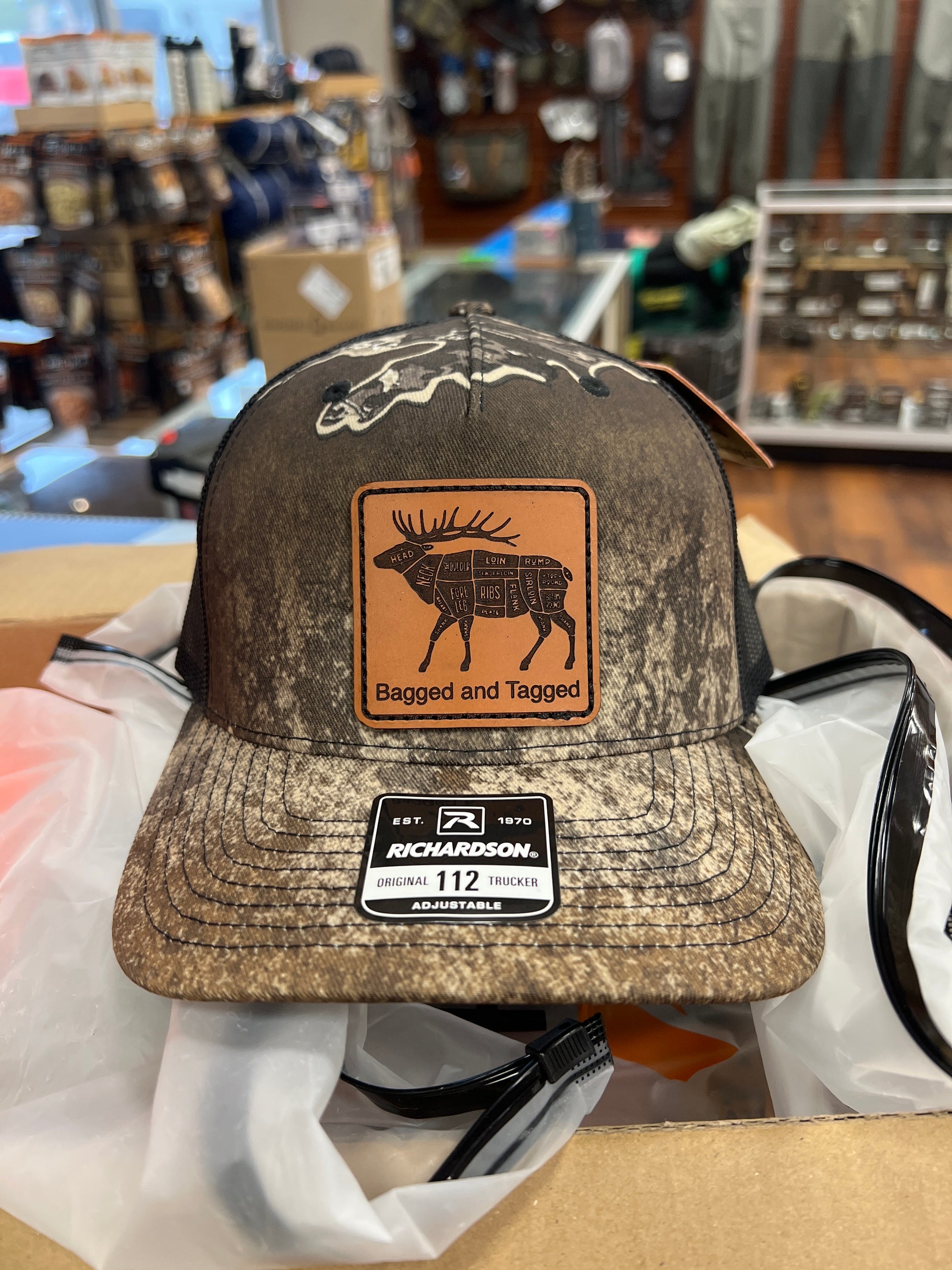 Bagged and Tagged hunting lifestyle hat for hunters — available at Glenwood Springs Outdoors