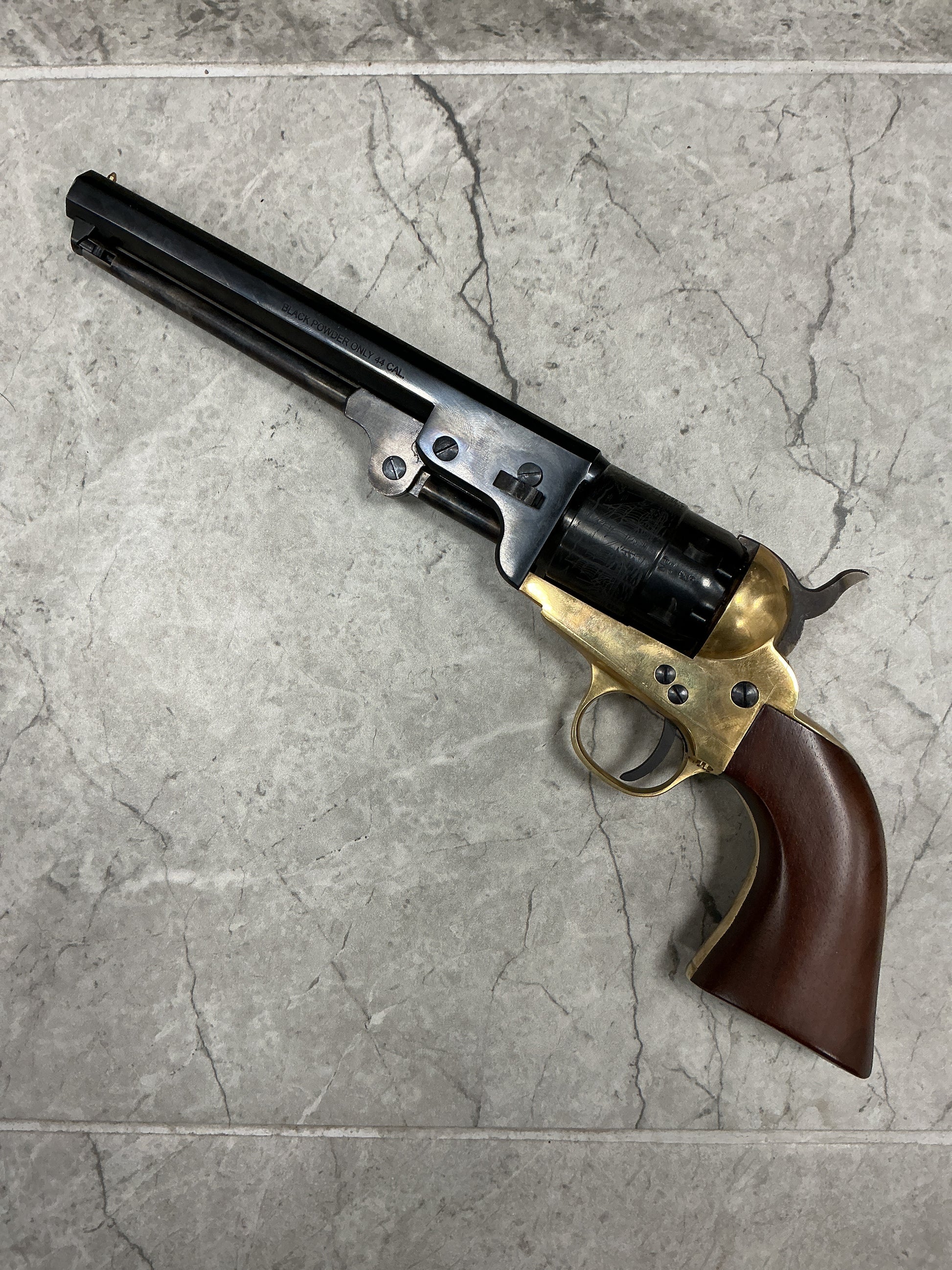 Traditions 1851 Navy .44 caliber 7.5-inch blue barrel black powder revolver — steel frame cap-and-ball with walnut grip