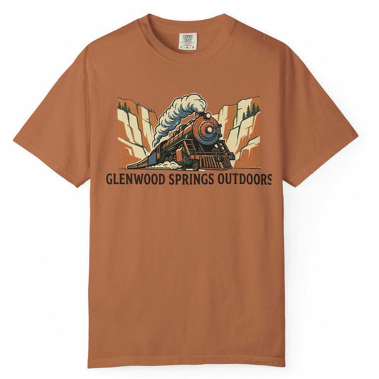 Brown t-shirt with a train graphic and 'Glenwood Springs Outdoors' text on a white background